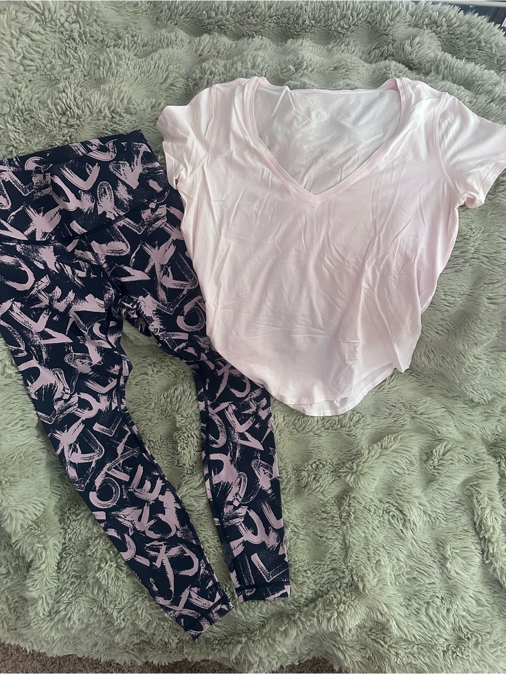 Lululemon Leggings and V-Neck Shirt.